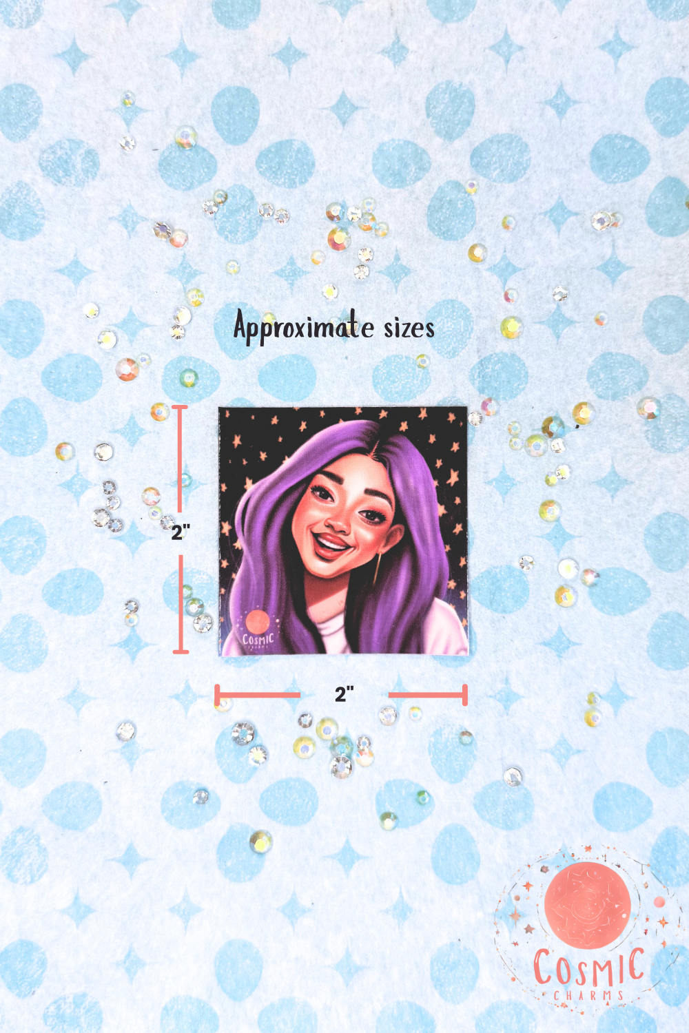 A top down view of a square sticker of Celeste Estrella smiling with long pastel purple hair on a black starry background. It showcases the dimensions of the sticker 2" x 2".
