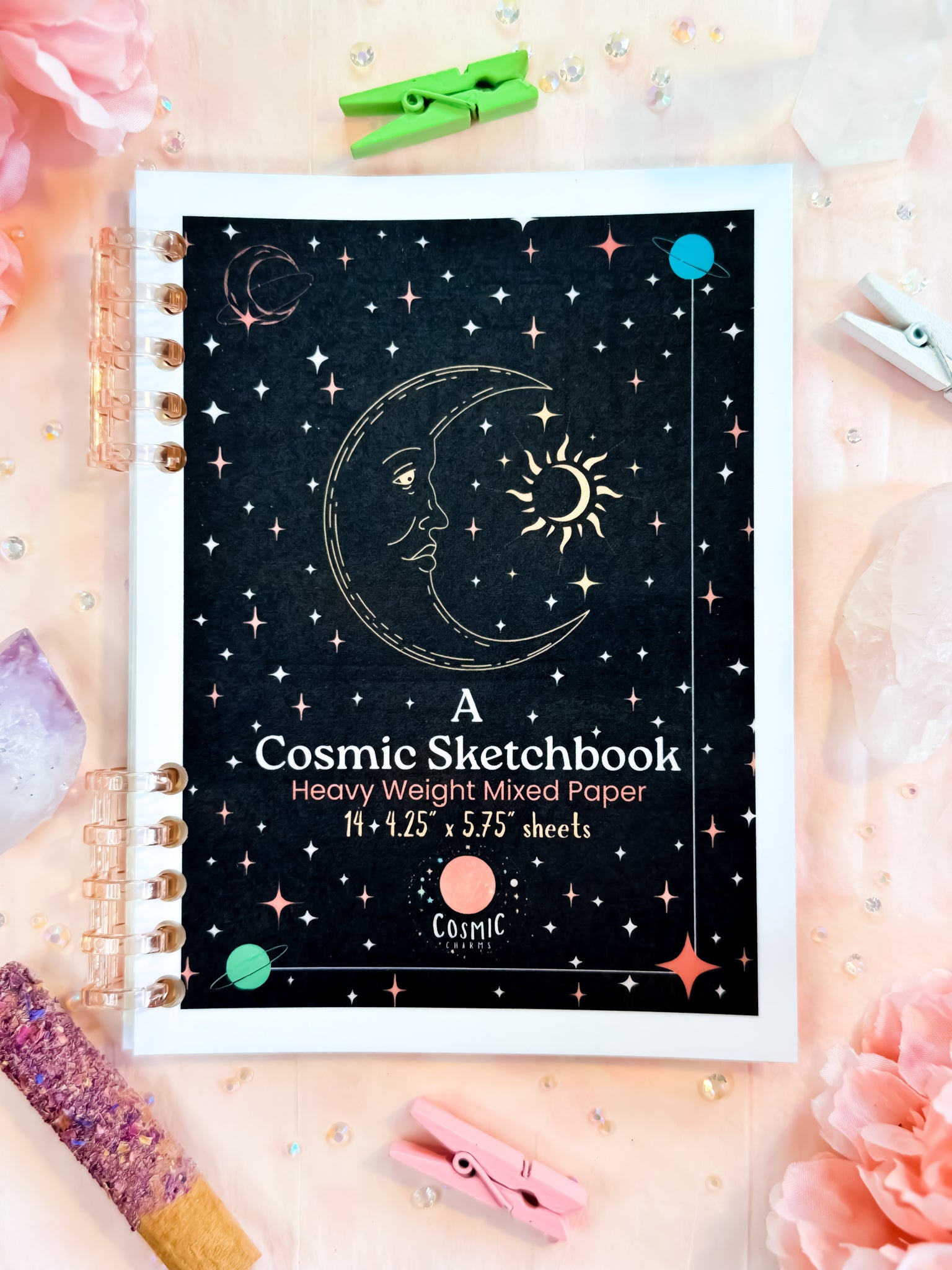 Handmade cosmic sketchbook with dark galaxy black cover and celestial design by Cosmic Charms